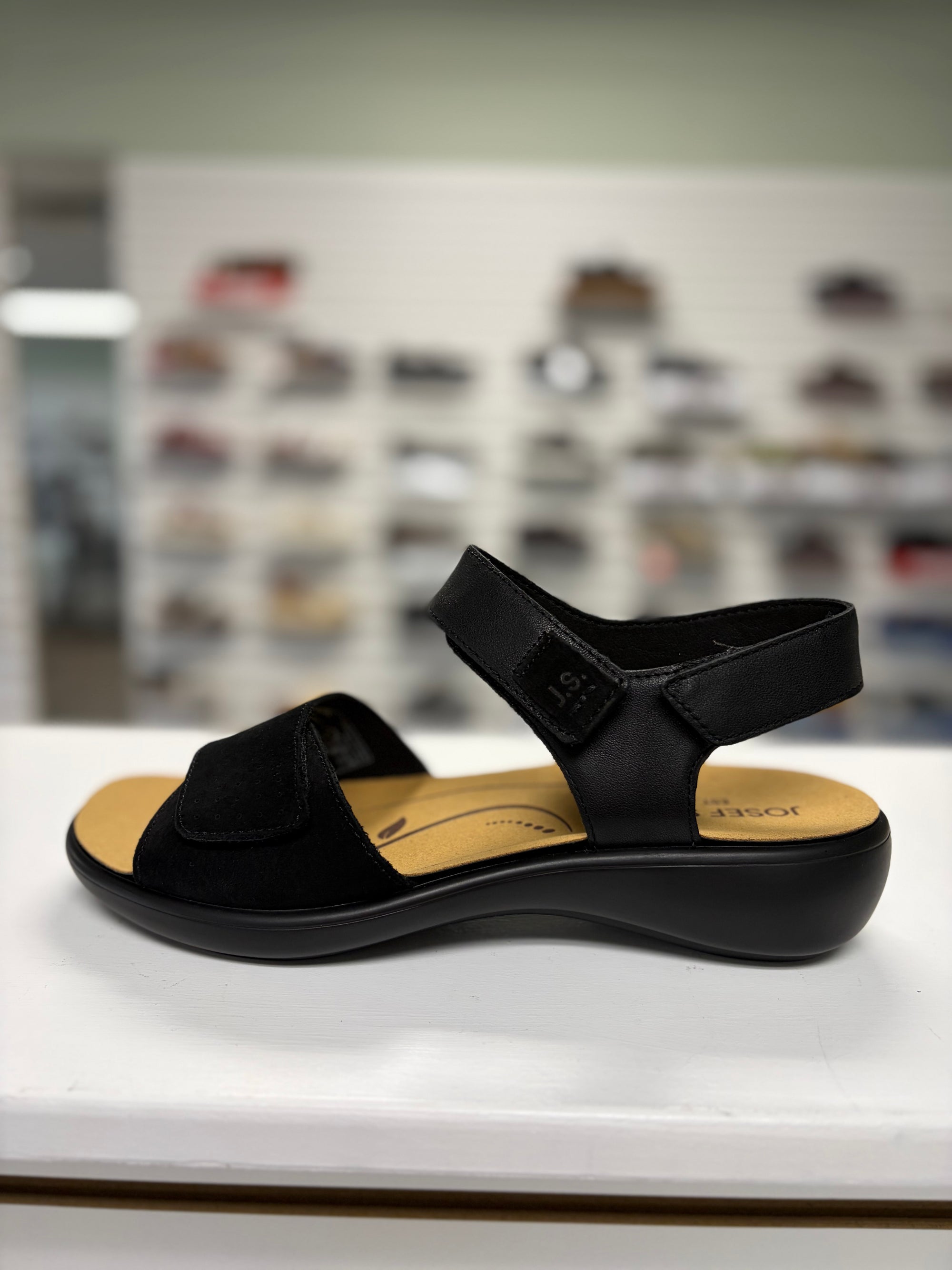 black sandal with velcro for full adjustability, orthotic friendly, cushy sole, dress up or dress down