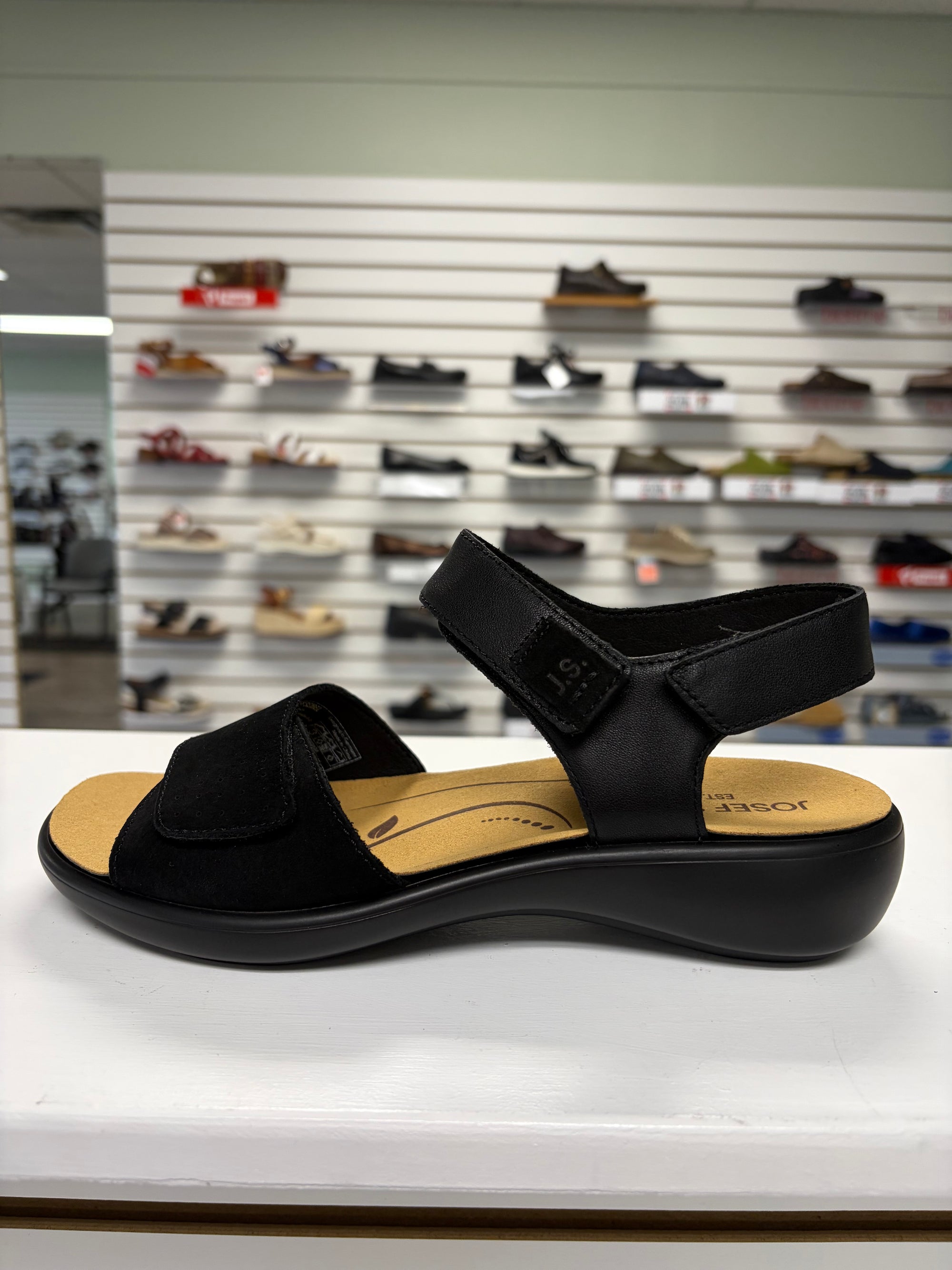 black sandal with velcro for full adjustability, orthotic friendly, cushy sole, dress up or dress down
